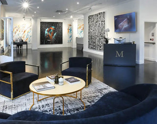 Shepherd Market gallery frontage of Maddox Gallery, showcasing contemporary artworks through large street‑level windows.