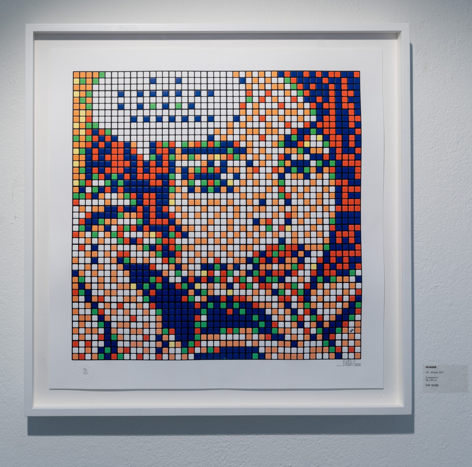 A tile mosaic of a cartoon woman on a phone titled, Oh...Alright (2011), by artist Invader, represents an era of Digi-cute artworks, one of the new art trends that are emerging in 2026.