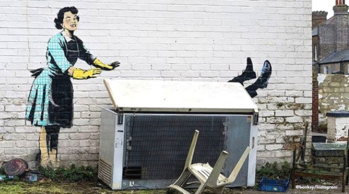  In the spirit of Banksy feminism, his Valentine&rsquo;s Day Mascara mural depicts a woman showing signs of domestic violence as a man&rsquo;s feet protrude from a freezer.